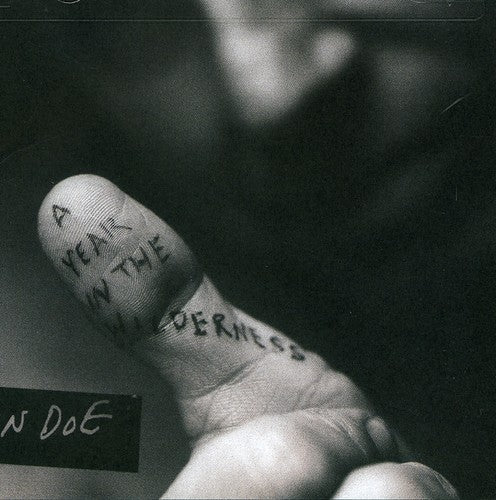 the album cover for John Doe - Year in Wilderness