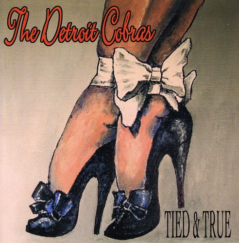 the album cover for The Detroit Cobras - Tied & True
