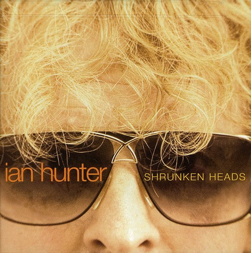 the album cover for Ian Hunter - Shrunken Heads