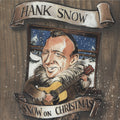 the album cover for Hank Snow - Snow On Christmas [Digipak]