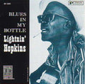 the album cover for Lightnin' Hopkins - Blues in My Bottle