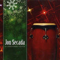 the album cover for Jon Secada - A Christmas Fiesta