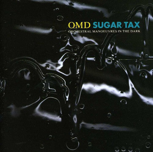 the album cover for Orchestral Manoeuvres in the Dark (O.M.D.) - Sugar Tax [Import]
