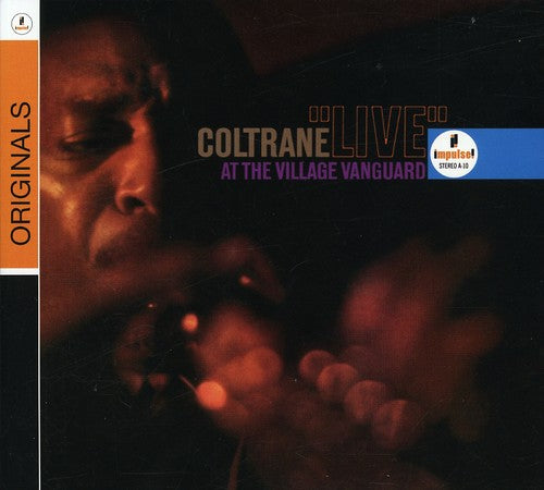 the album cover for John Coltrane Quartet - Live At The Village Vanguard