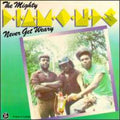 the album cover for Mighty Diamonds - Never Get Weary [Import]