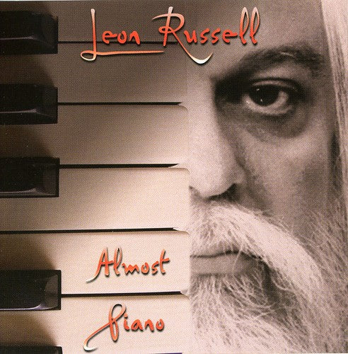 the album cover for Leon Russell - Almost Piano