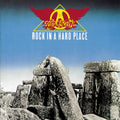 the album cover for Aerosmith - Rock in a Hard Place