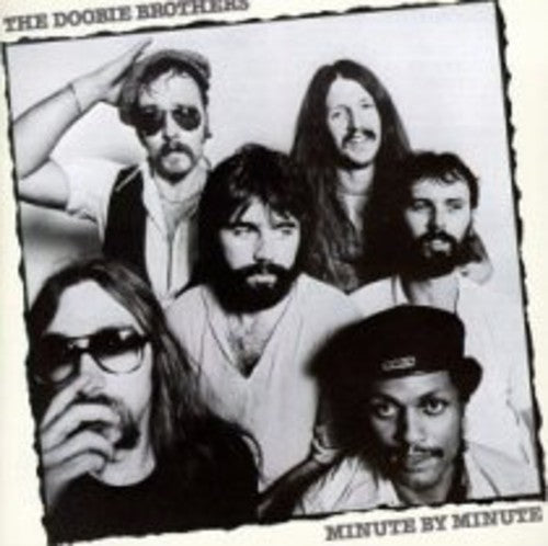 the album cover for The Doobie Brothers - Minute By Minute