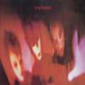 the album cover for The Cure - Pornography