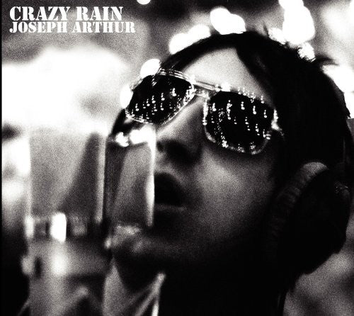the album cover for Joseph Arthur - Crazy Rain