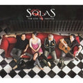 the album cover for Solas - For Love and Laughter