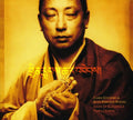 the album cover for Lama Gyurme - Rain of Blessings: Vajra Chants