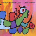 the album cover for Bruce Cockburn - Dancing in Dragon's Jaws