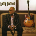 the album cover for Larry Carlton - Greatest Hits Re-recorded Volume One