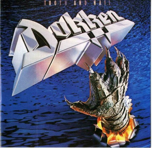the album cover for Dokken - Tooth and Nail