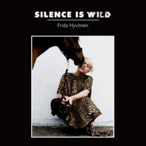 the album cover for Frida Hyvonen - Silence Is Wild