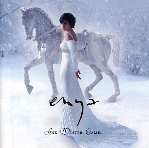 the album cover for Enya - And Winter Came...