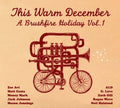 the album cover for Various Artists - This Warm December: Brushfire Holiday's, Vol. 1