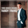 the album cover for Randy Travis - Three Wooden Crosses: The Inspirational Hits Of Randy Travis