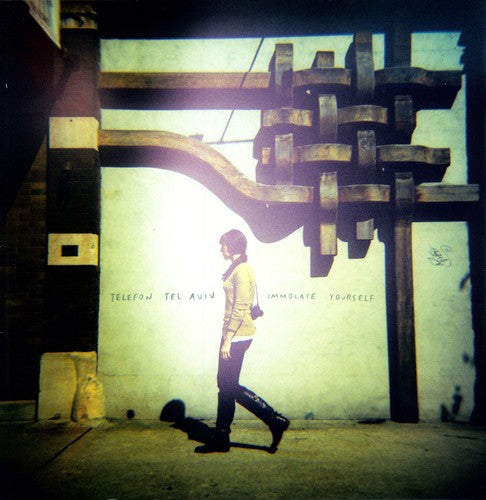 the album cover for Telefon Tel Aviv - Immolate Yourself