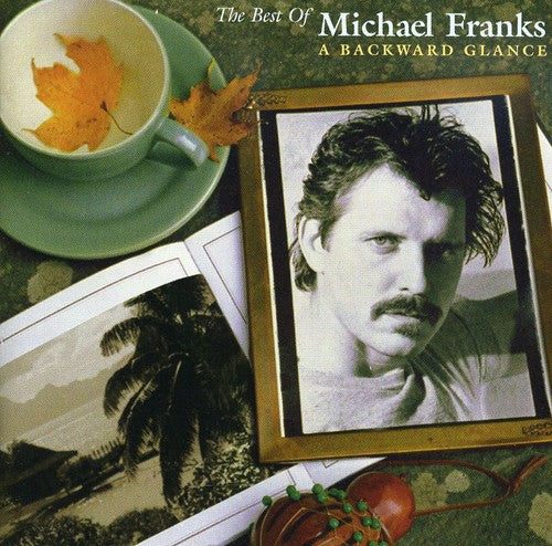 the album cover for Michael Franks - The Best Of Michael Franks: A Backward Glance