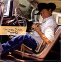 the album cover for George Strait - Twang