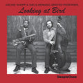 the album cover for Niels-Henning Ørsted Pedersen - Looking at Bird
