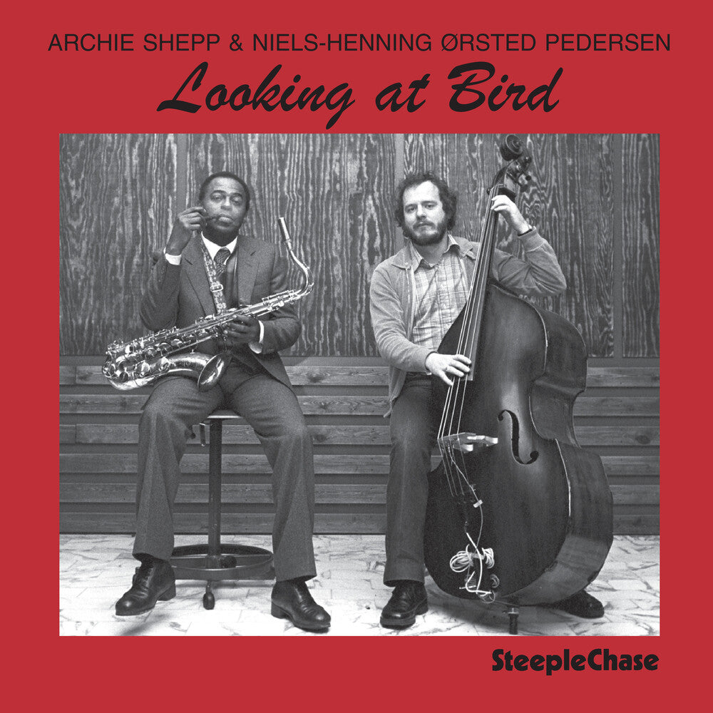 the album cover for Niels-Henning Ørsted Pedersen - Looking at Bird