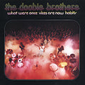 the album cover for The Doobie Brothers - What Were Once Vices Are Now Habits