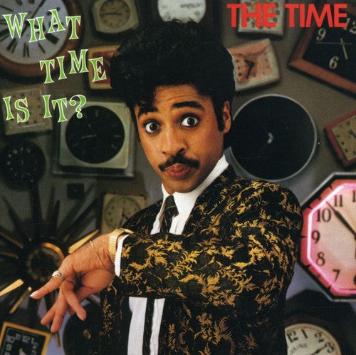 the album cover for The Time - What Time Is It