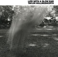 the album cover for Taylor Hollingsworth - Life With A Slow Ear [Import]