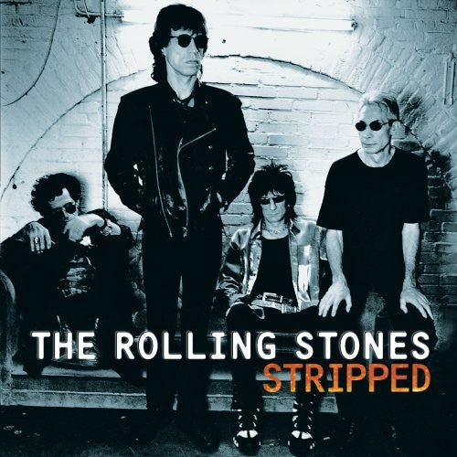 the album cover for The Rolling Stones - Stripped
