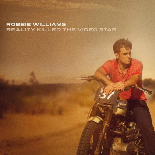 the album cover for Robbie Williams - Reality Killed The Video Star [Import]