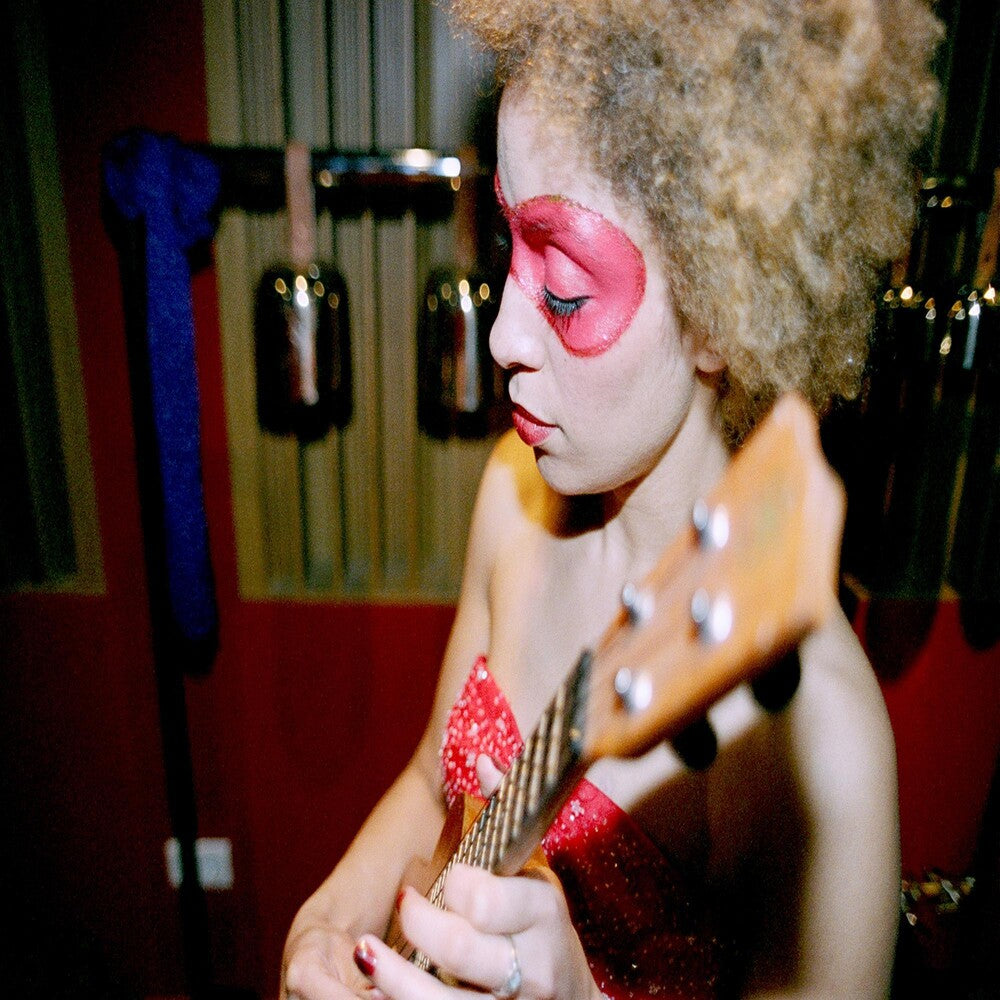 the album cover for Martina Topley-Bird - Some Place Simple
