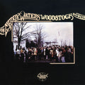 the album cover for Muddy Waters - The Muddy Waters Woodstock Album