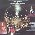 the album cover for Three Dog Night - Captured Live at the Forum