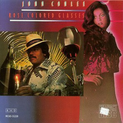 the album cover for John Conlee - Rose Colored Glasses