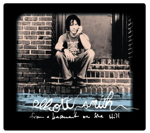 the album cover for Elliott Smith - From A Basement On The Hill