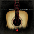 the album cover for Darrell Scott - A Crooked Road