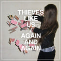 the album cover for Thieves Like Us - Again & Again