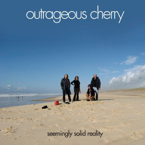 the album cover for Outrageous Cherry - Seemingly Solid Reality