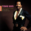 the album cover for Tyrone Davis - Give It Up: The Very Best of the Columbia Years