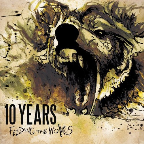 the album cover for 10 Years - Feeding The Wolves [Delixe Edition]