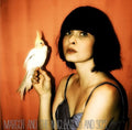 the album cover for Margot & The Nuclear So And So's - Buzzard