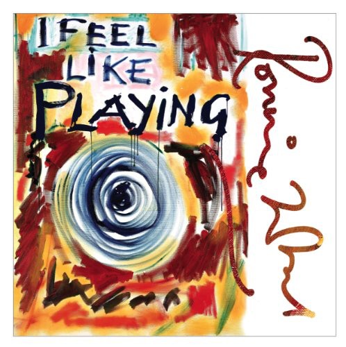 the album cover for Ronnie Wood - I Feel Like Playing