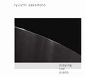 the album cover for Ryuichi Sakamoto - Playing the Piano