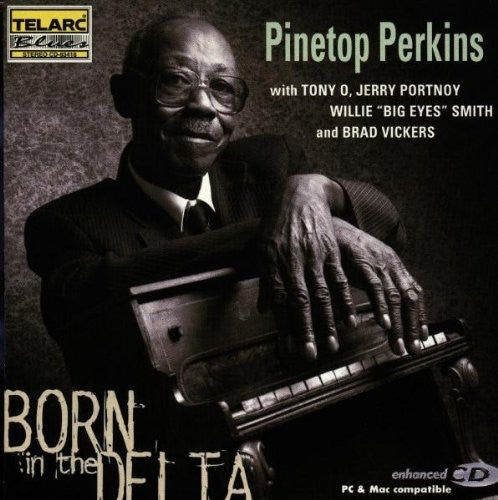 the album cover for Pinetop Perkins - Born in the Delta