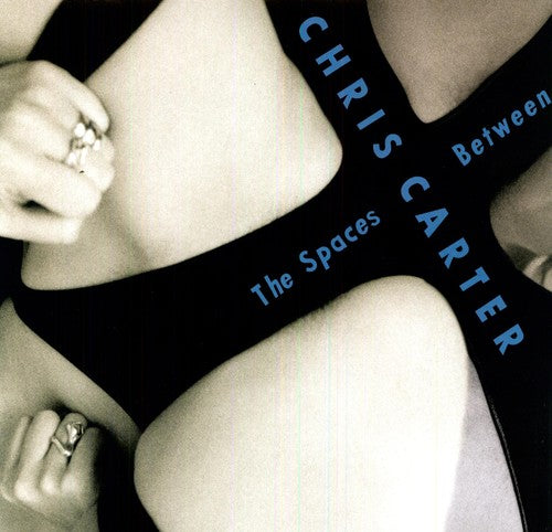 the album cover for Chris Carter - The Spaces Between