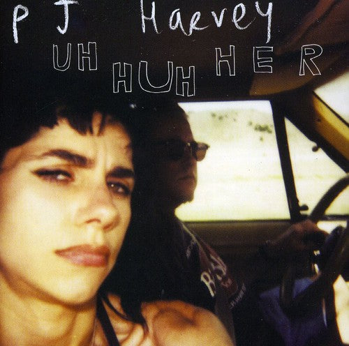 the album cover for PJ Harvey - Uh Huh Her [Import]