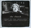 the album cover for The Church - Deep In The Shadows: 30th Anniversary Singles Collection